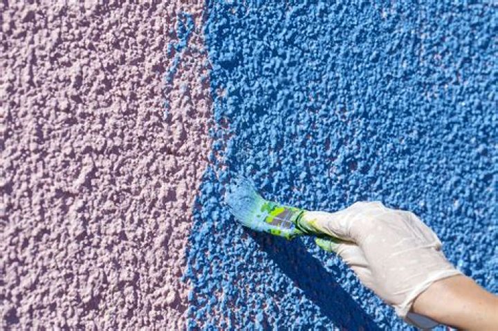 Can I paint stucco with a roller?