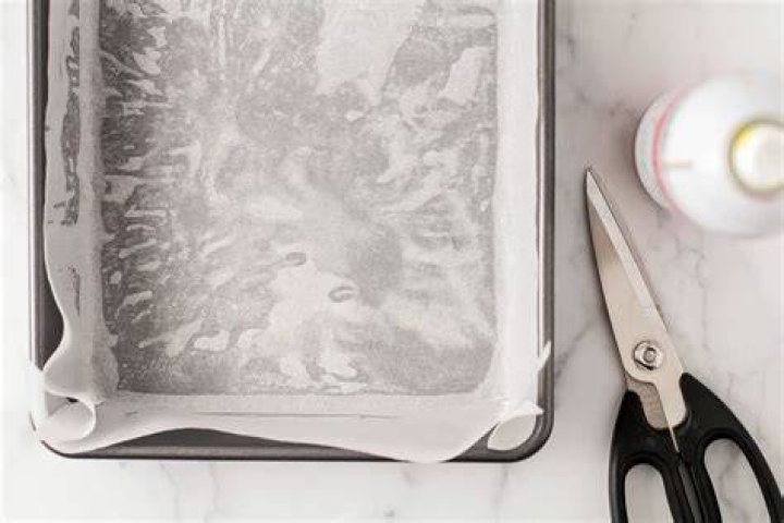 Can I use parchment paper instead of greasing a cookie sheet?