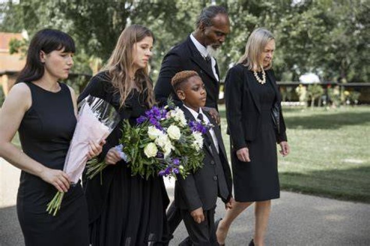 Can I wear black and white to a funeral?