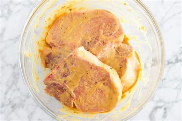 Do you cover meat when marinating?
