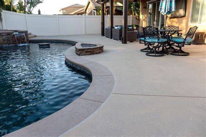 How do I keep my concrete pool deck cool?