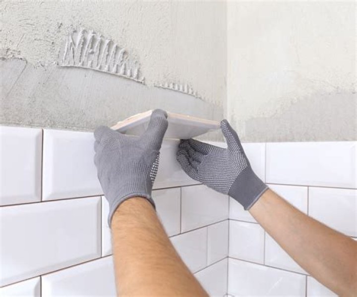 How do you fix a bowed wall for tiling?