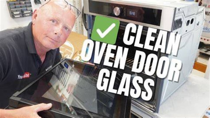 What can I use to clean the glass on my oven door?
