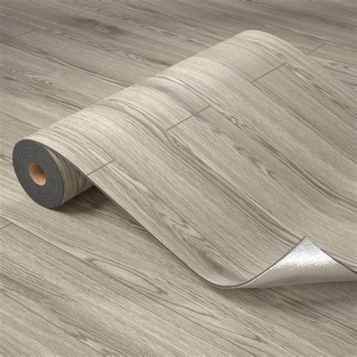 What can I use to stick vinyl to wood?