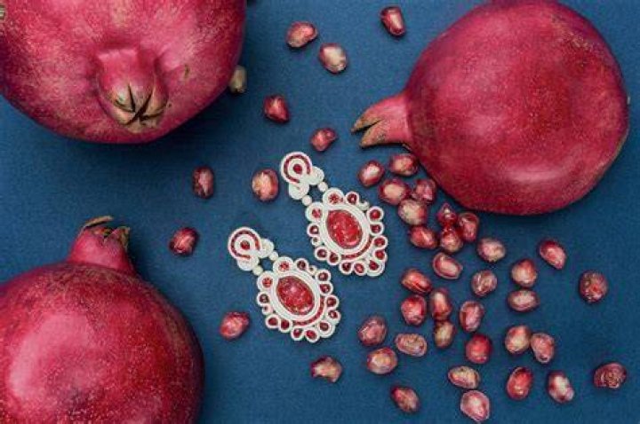 What do pomegranates symbolize?