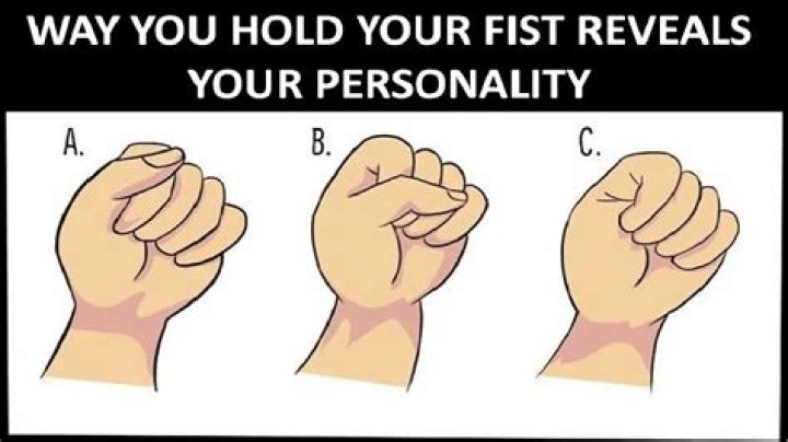 What does it mean when you tuck your thumb in your fist?