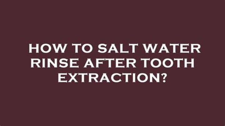 When can I stop rinsing with salt water after tooth extraction?