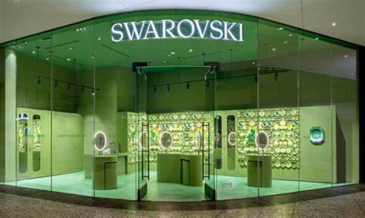 Who owns Swarovski brand?
