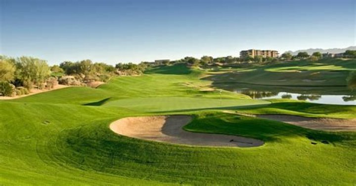 Why do golf courses cover the greens?