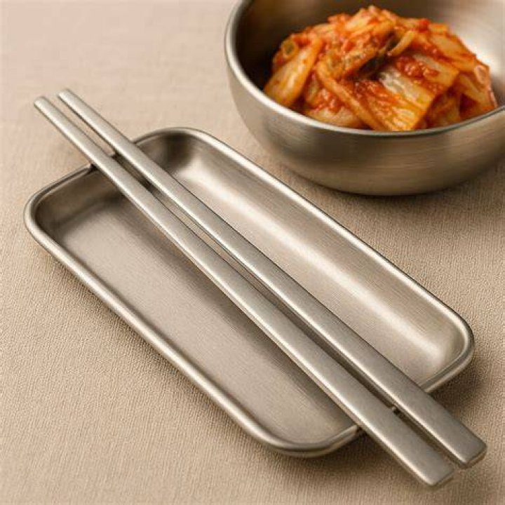 Why do Koreans use metal chopsticks?