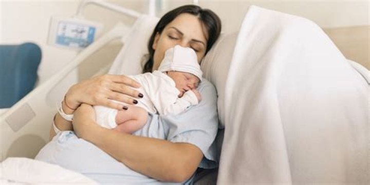 Why does a woman's body shake after giving birth?