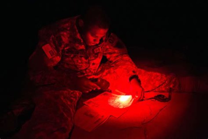Why does the military use red lights at night?
