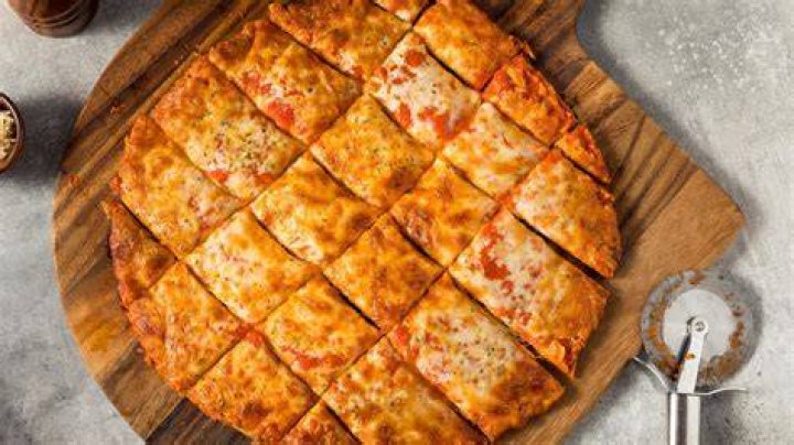 Why is Chicago pizza cut in squares?